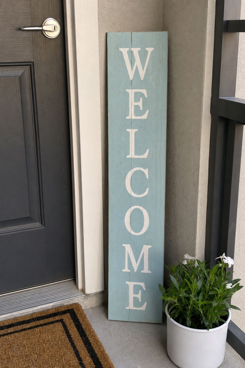 A Painted Wood Welcome Sign small apartment idea for Top 17 Door Summer Decor Ideas for Small Apartments.