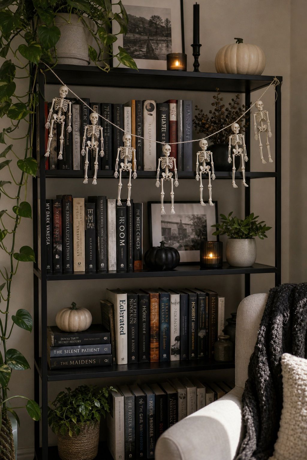 Hang a Skeleton Garland Across the Mantel or Bookshelf small apartment idea for Top 18 Small Apartment Halloween Decorations That Make a Big Impact in Tiny Spaces.