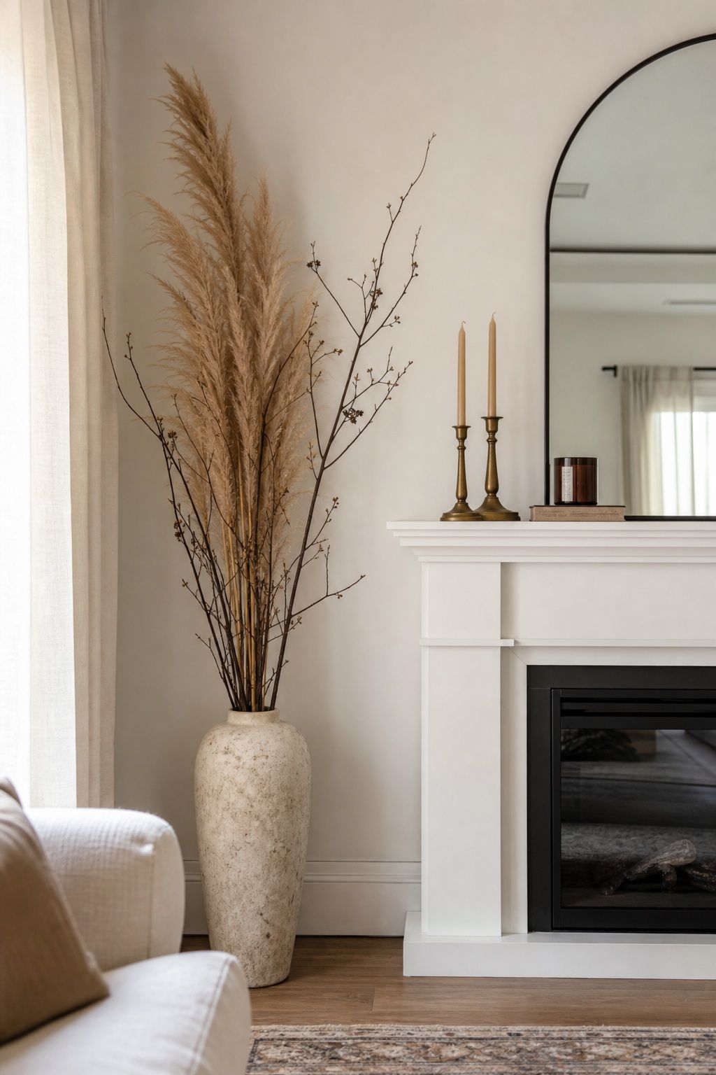 Add Tall Pampas or Branches in a Floor Vase small apartment idea for Top 18 Autumn Decor for Fireplaces in Small Spaces.