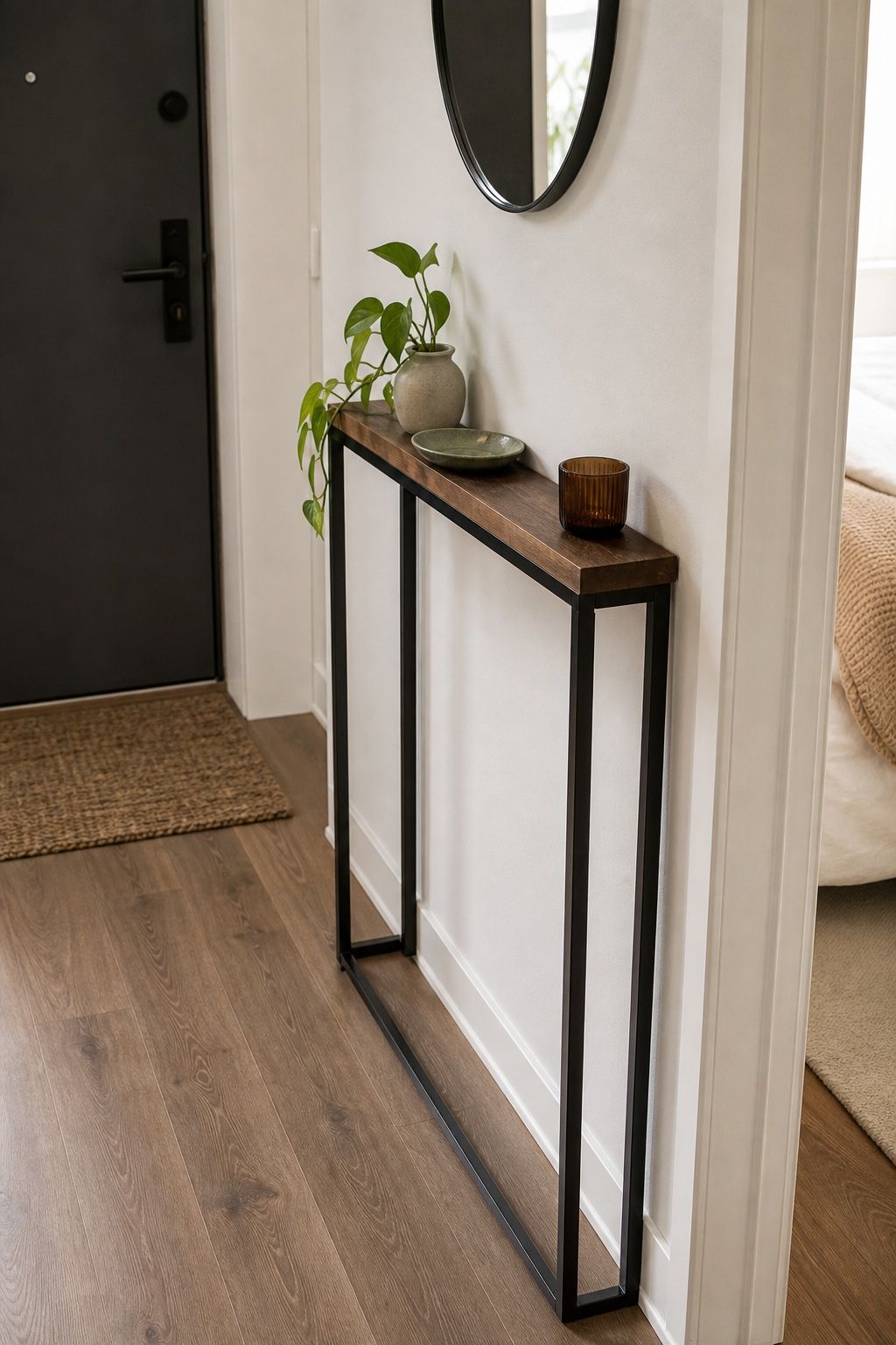 Use a Narrow Console Table Under 12 Inches Deep small apartment idea for Top 18 Small Apartment Entryway Ideas When You Have No Foyer.