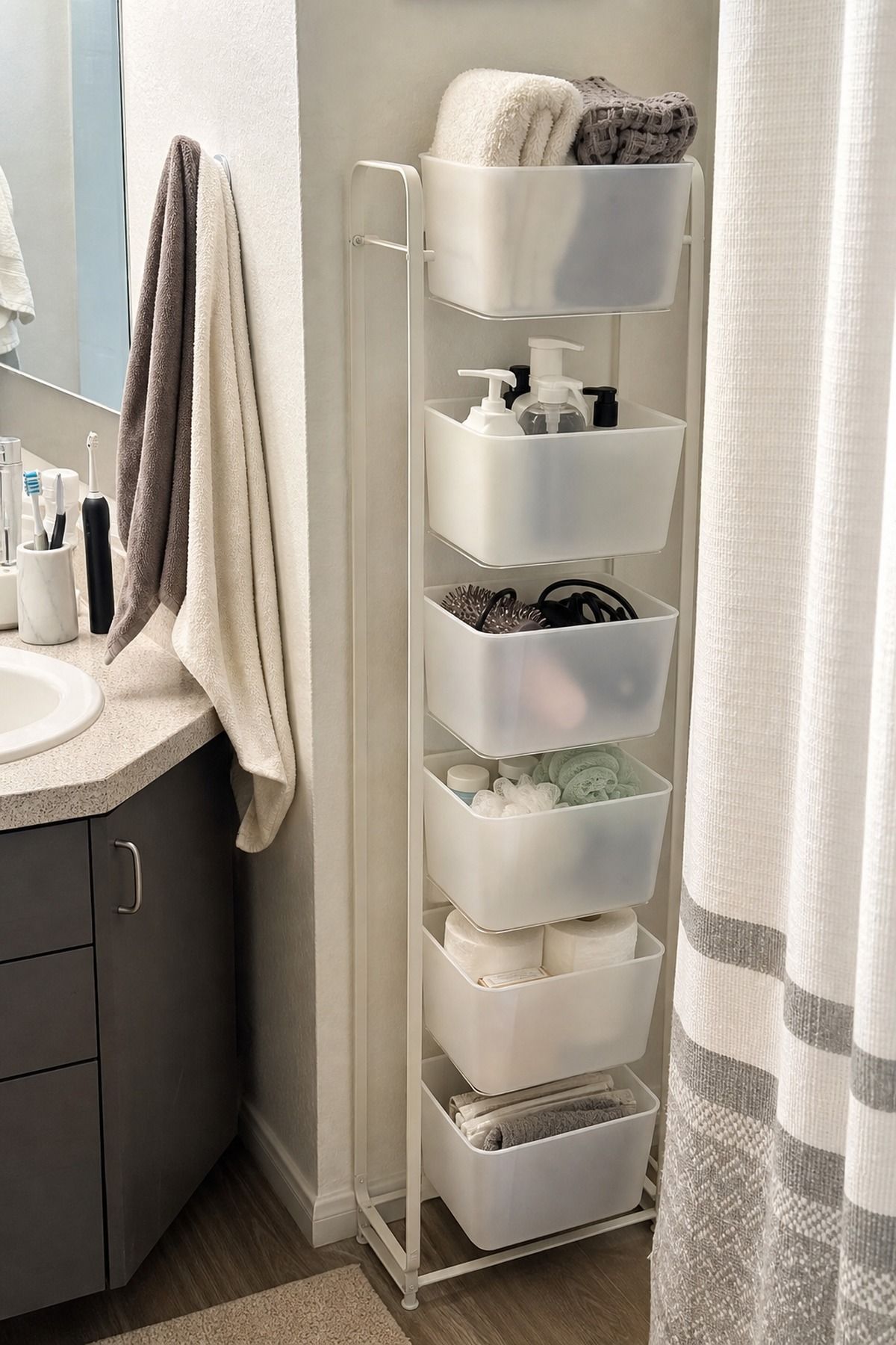 Use Stackable Bins to Build Up, Not Out small apartment idea for Top 19 Space-Saving College Dorm Bathroom Ideas Students Swear By.