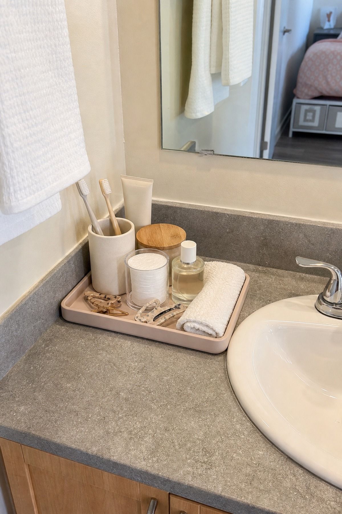 Corral Counter Items on a Small Tray small apartment idea for Top 19 Space-Saving College Dorm Bathroom Ideas Students Swear By.