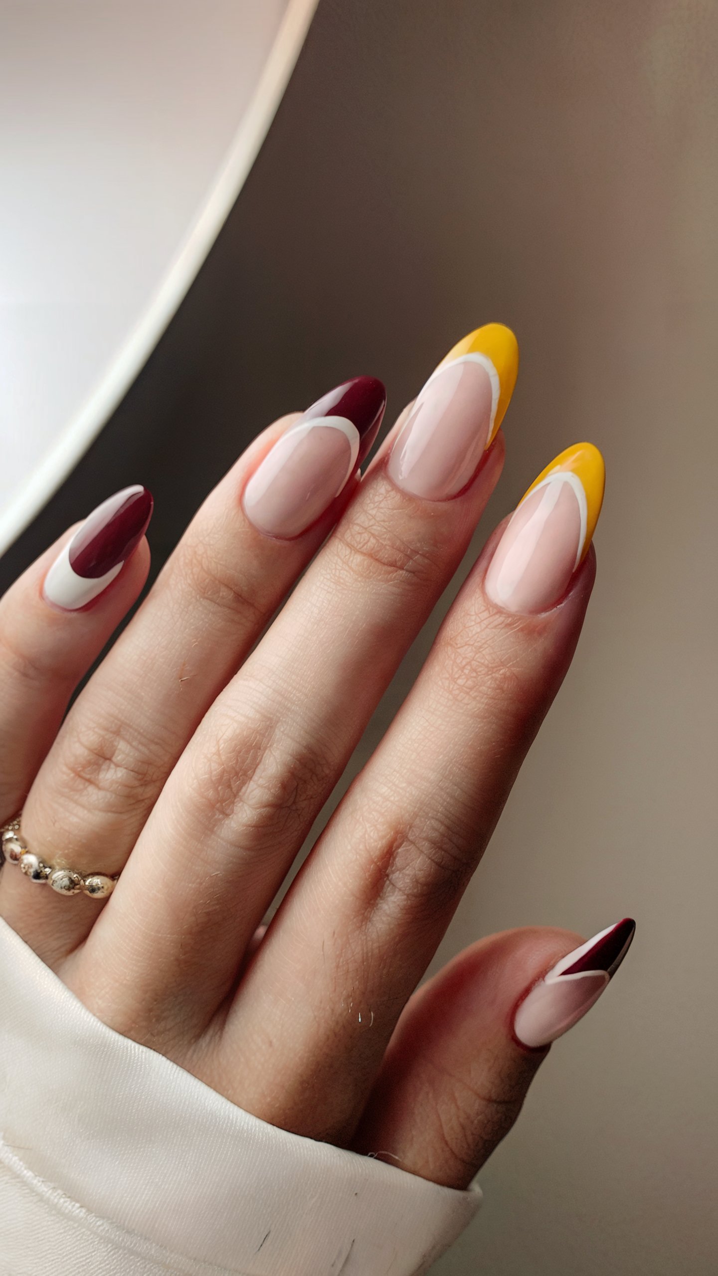Complete your look with these 10 stunning graduation nails ideas. From milky swirls to graduation cap accents, find the perfect design for your celebration.