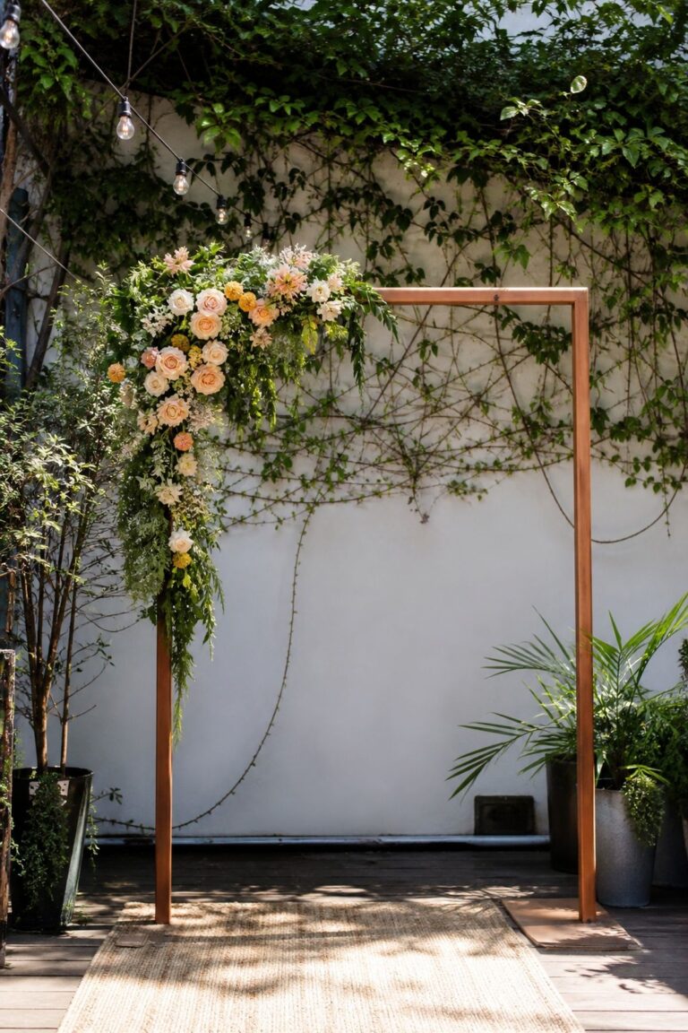 Build an Asymmetric Floral Drape on One Corner small apartment idea for Top 17 Summer Wedding Arch Decor Ideas That Frame Your Ceremony Perfectly.