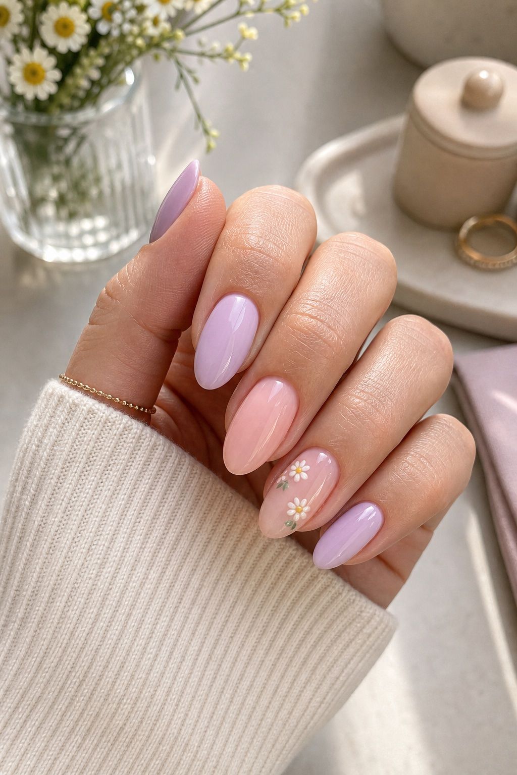 Tiny Floral Accents on One or Two Nails Easter nail design on a realistic hand.