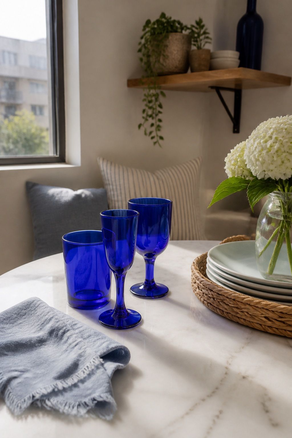 Cobalt Blue Glassware small apartment idea for Top 17 Light and Airy Blue Summer Decor Inspirations for Small Apartments.
