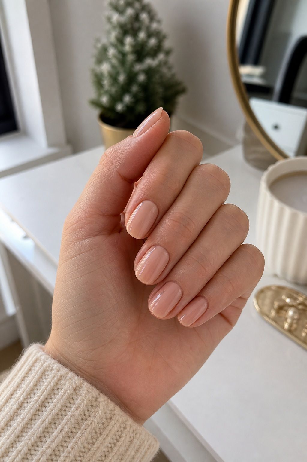 A Clean Nude With a Glossy Finish small apartment idea for Top 16 Trendy Christmas Nail Ideas for the Holidays.