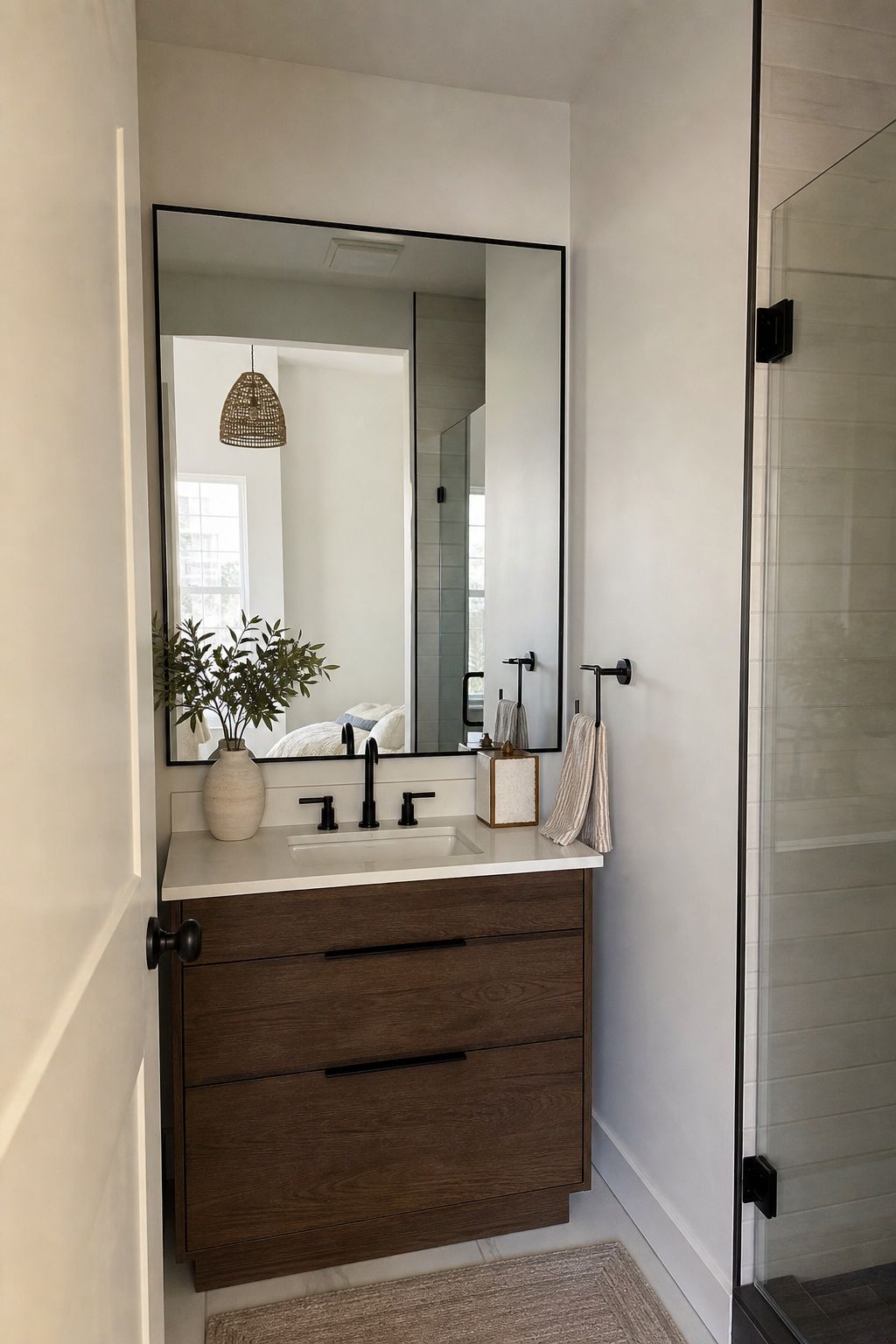 Hang a Mirror Bigger Than the Vanity small apartment idea for Top 16 Small Apartment Bathroom Ideas That Maximize Every Inch.