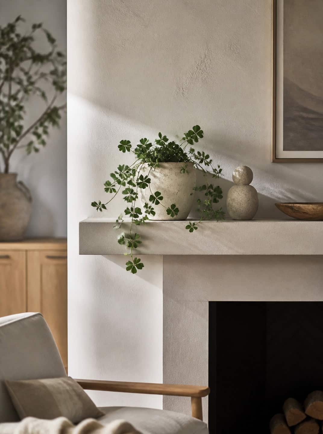 Classy St. Patrick's Day decor: green plant on a stone mantel