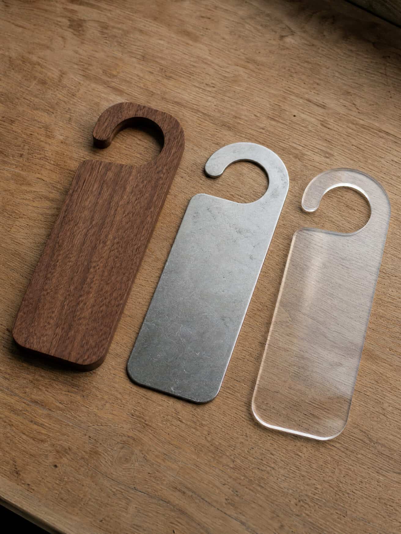 Three door hangers: wood, metal, and clear acrylic, for summer door hanger ideas.