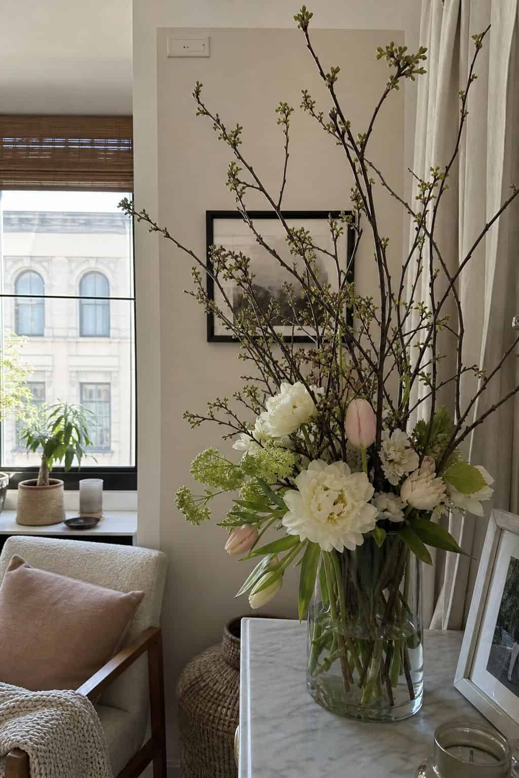 Add Budding Branches for Height and Drama small apartment idea for Top 17 Easter Flower Arrangement Ideas for a Fresh Spring Look.