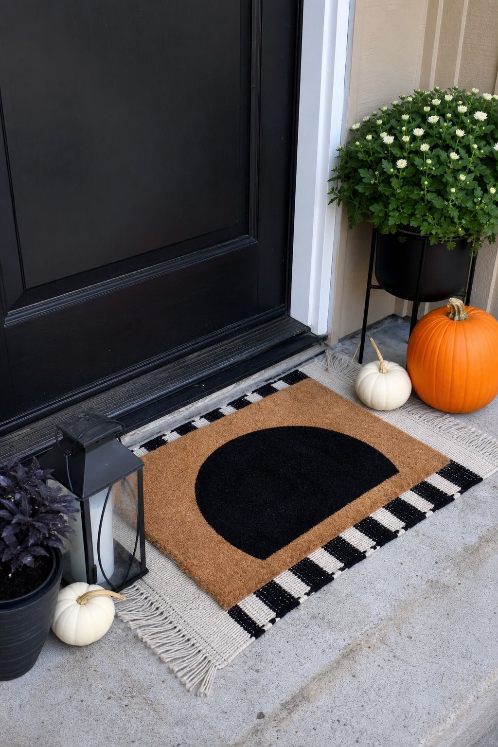 Create a Spooky Doormat and Threshold small apartment idea for Top 19 Front Porch Halloween Decor Ideas for Apartments and Small Outdoor Spaces.
