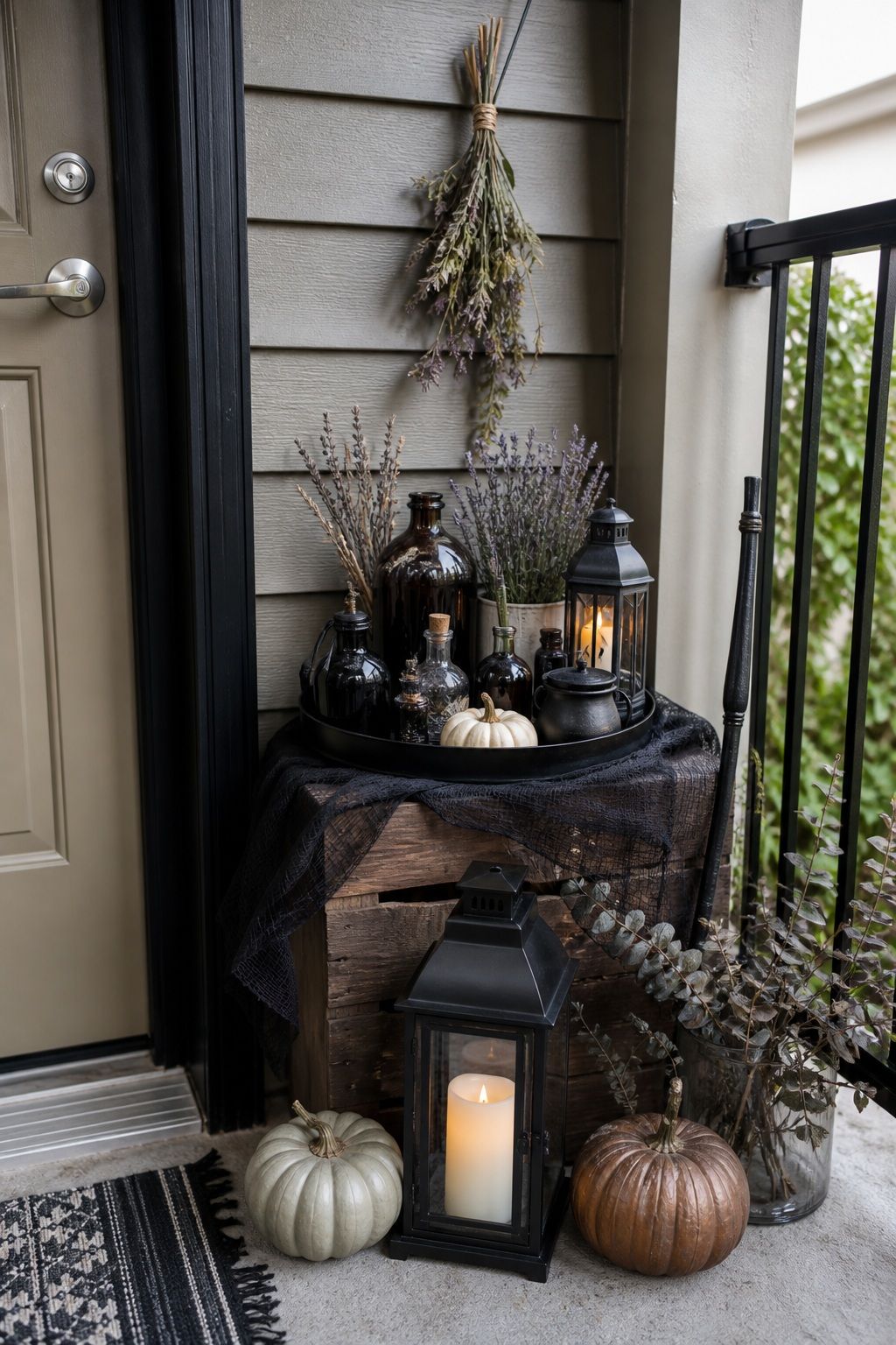 Style a Witchy or Apothecary Vignette small apartment idea for Top 19 Front Porch Halloween Decor Ideas for Apartments and Small Outdoor Spaces.