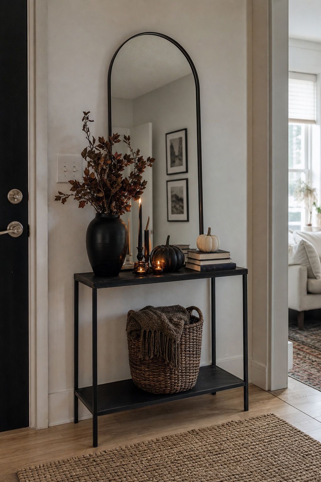 Anchor the Console With a Mirror or Framed Art small apartment idea for Top 17 Halloween Entryway Decor Ideas for Apartments.