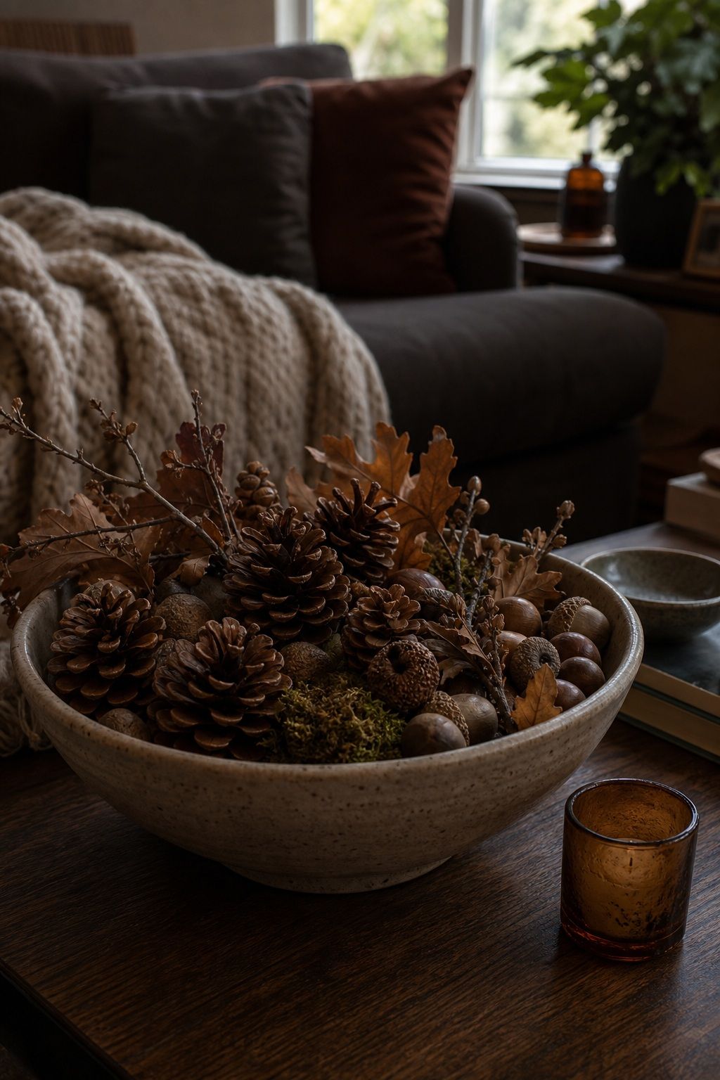 Fill Bowls With Pinecones and Natural Elements small apartment idea for Top 16 Moody Fall Decor Ideas for Small Apartments.