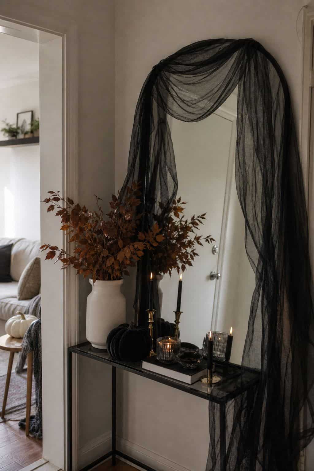 Drape Sheer Black Fabric for Drama small apartment idea for Top 19 Simple Halloween Decor Ideas for Small Apartments.