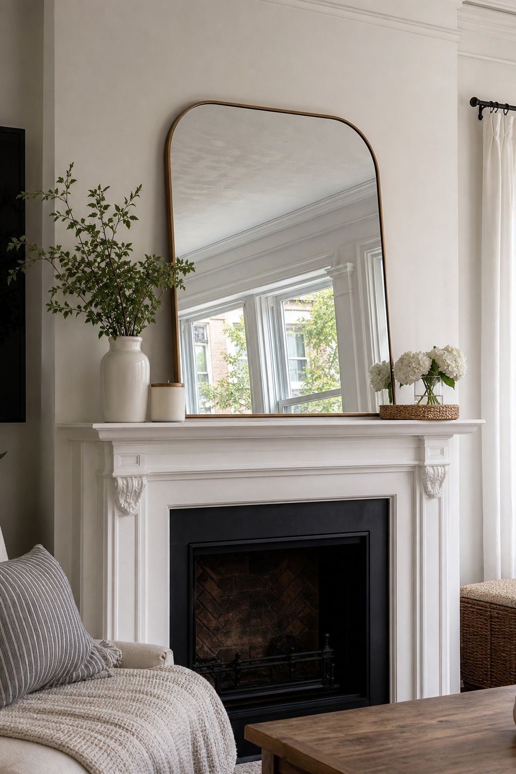 Use a Mirror to Brighten the Mantel small apartment idea for Top 20 Summer Mantel Decorating Ideas for Small Spaces.