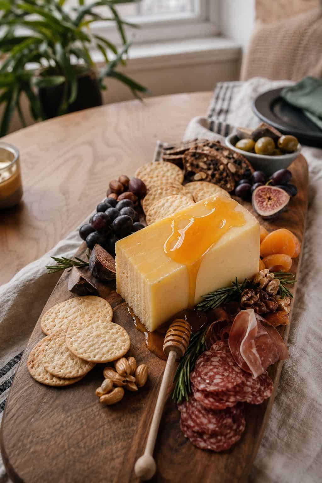 Drizzle Hot Honey Over the Aged Cheddar small apartment idea for Top 16 Thanksgiving Charcuterie Board Ideas for a Cozy Holiday Spread.