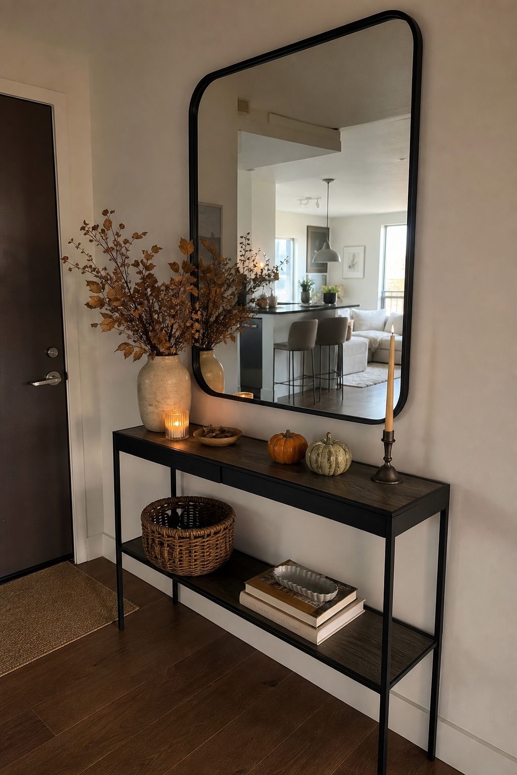 Hang an Oversized Mirror Above the Console small apartment idea for Top 16 Thanksgiving Entryway Decor Ideas for Apartments.