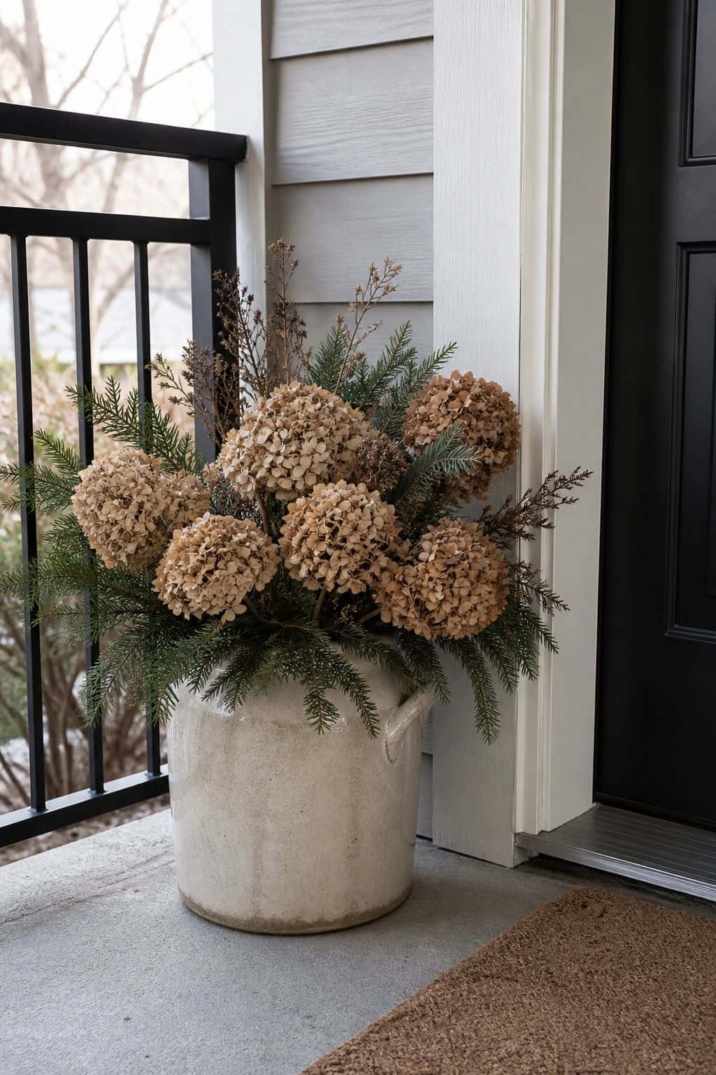 Use Dried Hydrangeas from Last Summer small apartment idea for Top 17 Winter Porch Decor Ideas for Apartments and Small Outdoor Spaces.