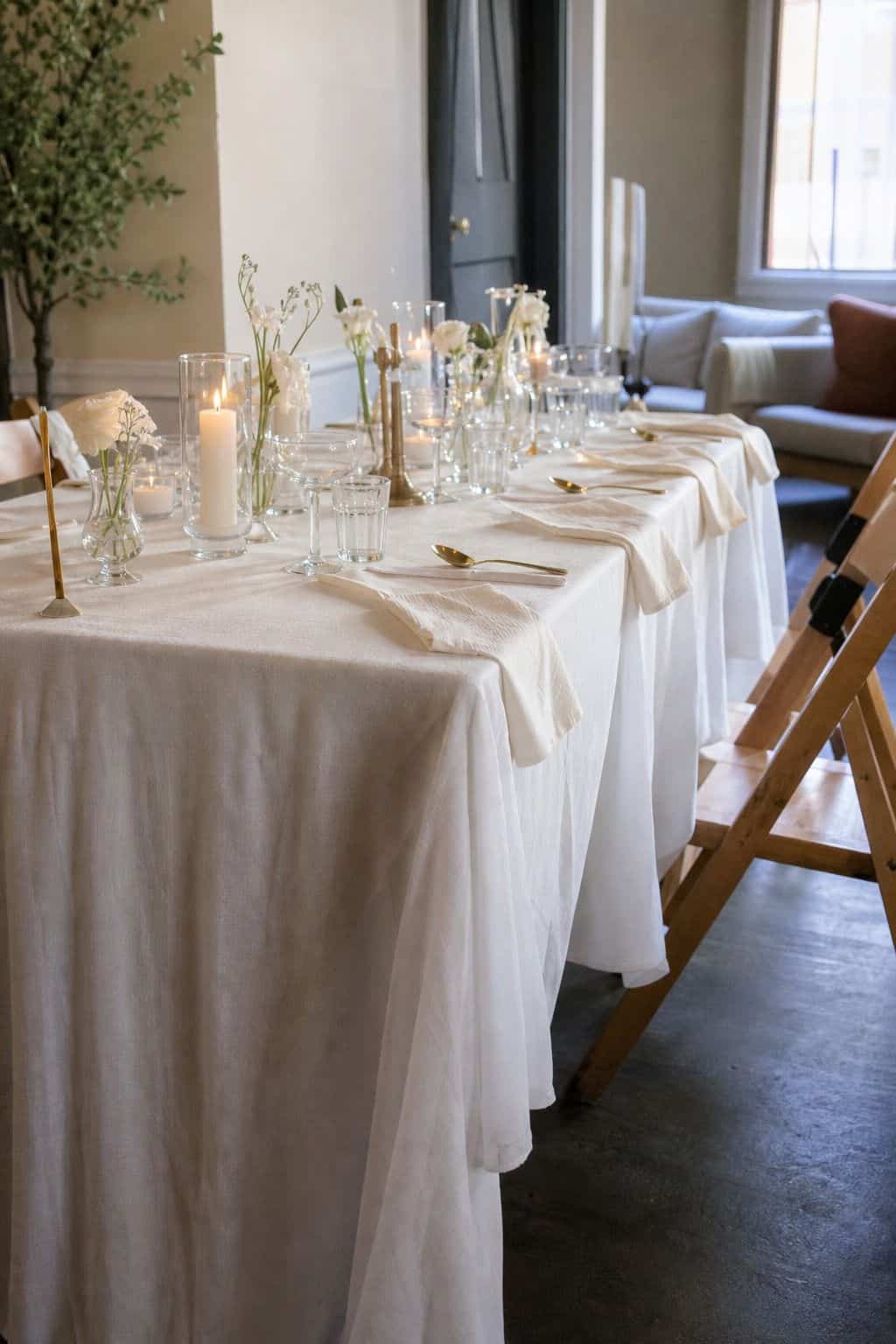 White Linen-Look Tablecloths Bulk styled on a wedding reception table